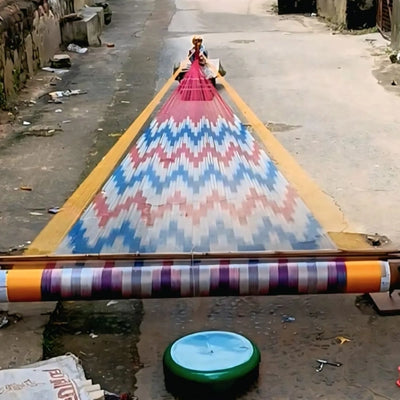 Loom & Trust craftsmen weaving traditional textiles